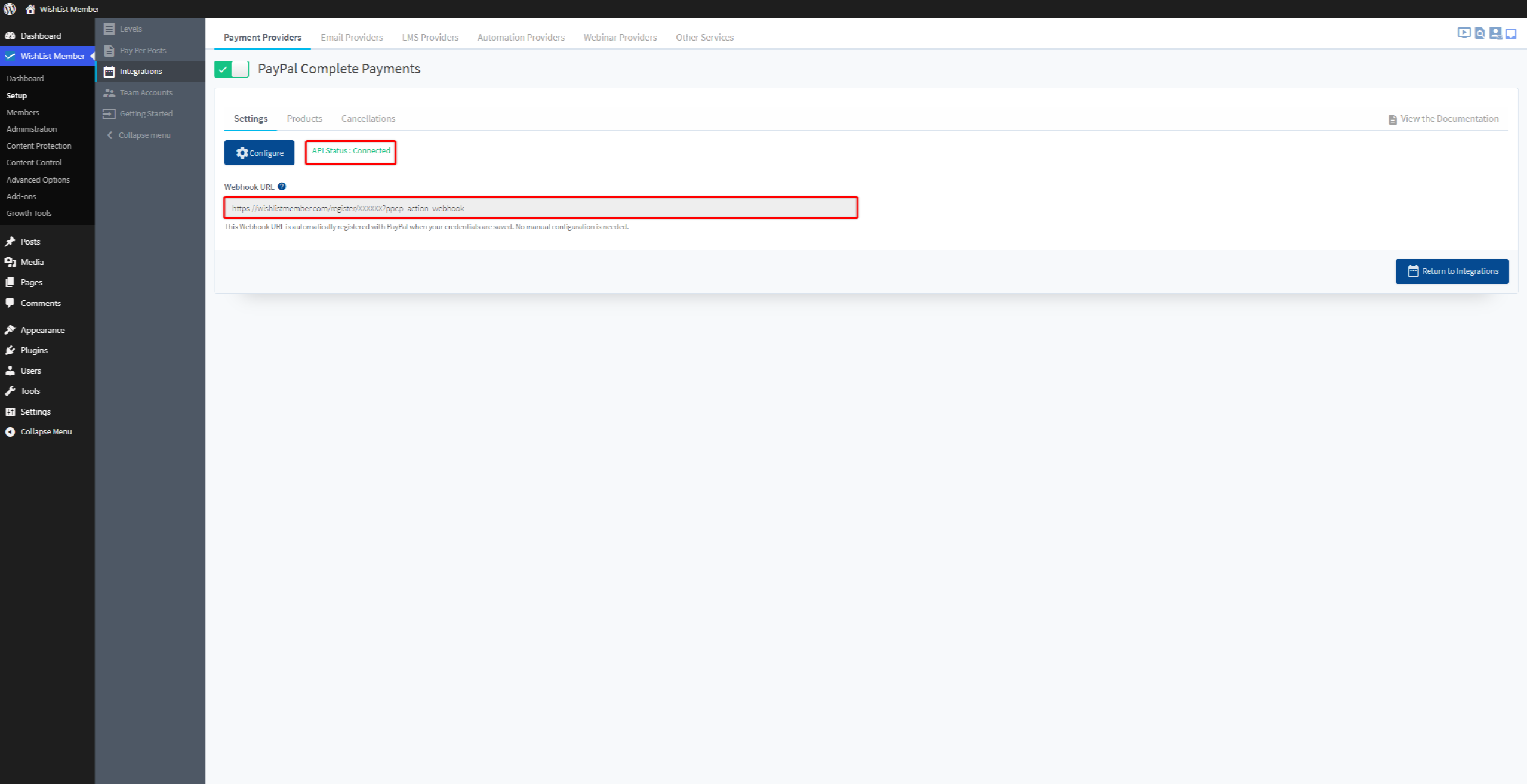PayPal Complete Payments settings page showing connected API status and webhook URL field in a WordPress admin panel